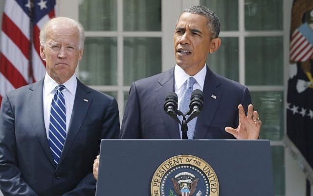 President Barack Obama stands with Vice President Joe Biden as he makes a statement about Syria in the Rose Garden at the White House in Washington, Saturday, Aug. 31, 2013. (Photo credit: AP Photo/Charles Dharapak)