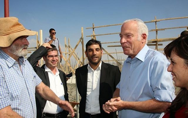 Housing Minister Uri Ariel (second from right) and Deputy Transportation Minister Tzipi Hotovely (right) during visit to the settlement of Kochav Yaakov in August 2013 (photo credit: Sasson Tiram/ Ministry of Housing and Construction)