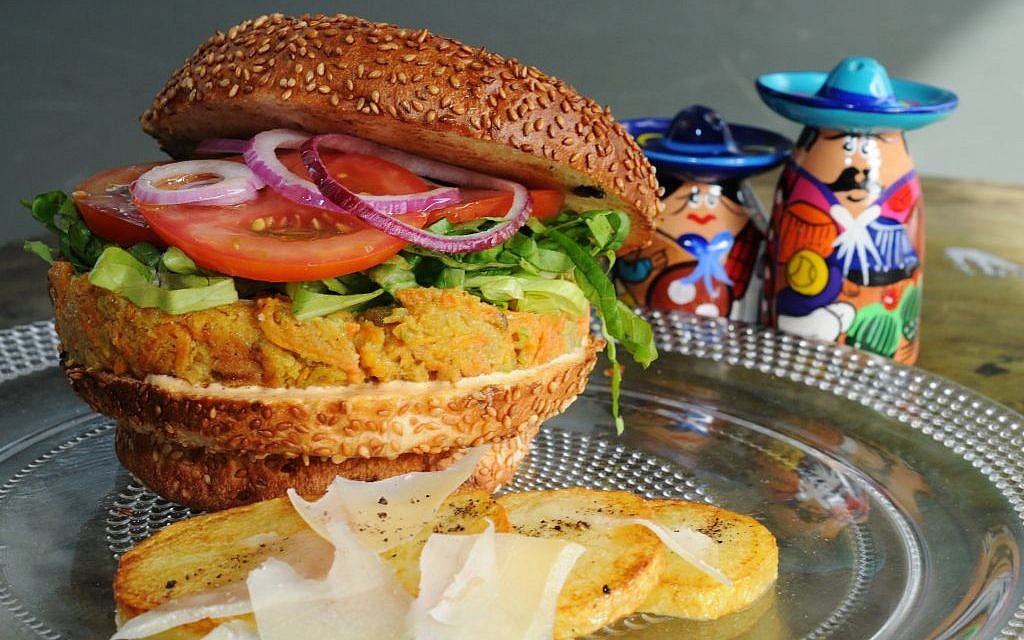 Take a bite out of Cafe Christopher's veggie burger, only in Jaffa. (photo credit: Courtesy Phyllis Glazer)