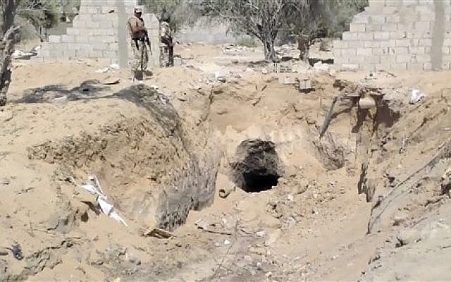 Egyptian army personnel supervise the destruction of tunnels between Egypt and the Gaza Strip at the border, near the town of Rafah, northern Sinai, Egypt, September 2013. (photo credit: AP/AP Television)