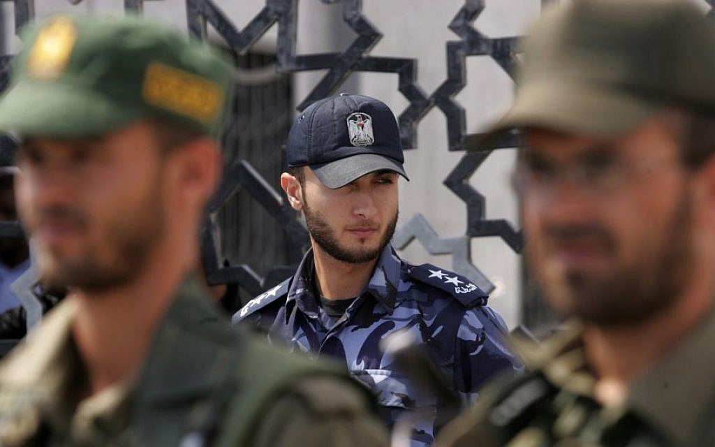 Hamas security forces stand guard in front of the Rafah border crossing in the southern Gaza Strip, on September 16, 2013. (photo credit: Flash90/Abed Rahim Khatib)