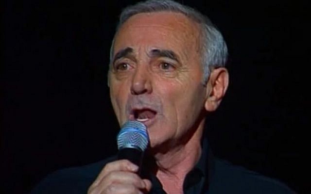 Charles Aznavour at a 1997 concert in Paris (screen capture: YouTube)