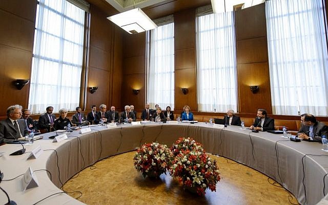 Delegates from the P5+1 and Iran meet in Geneva, at the start of two days of talks regarding Tehran's nuclear program, Tuesday, October 15, 2013 (photo credit: AP/Fabrice Coffrini)