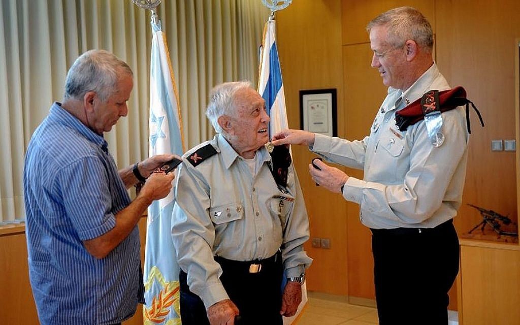 Lt. Gen. Benny Gantz (right), slipping the general's rank on Pundak's left shoulder. (photo credit: IDF Spokesperson's blog)