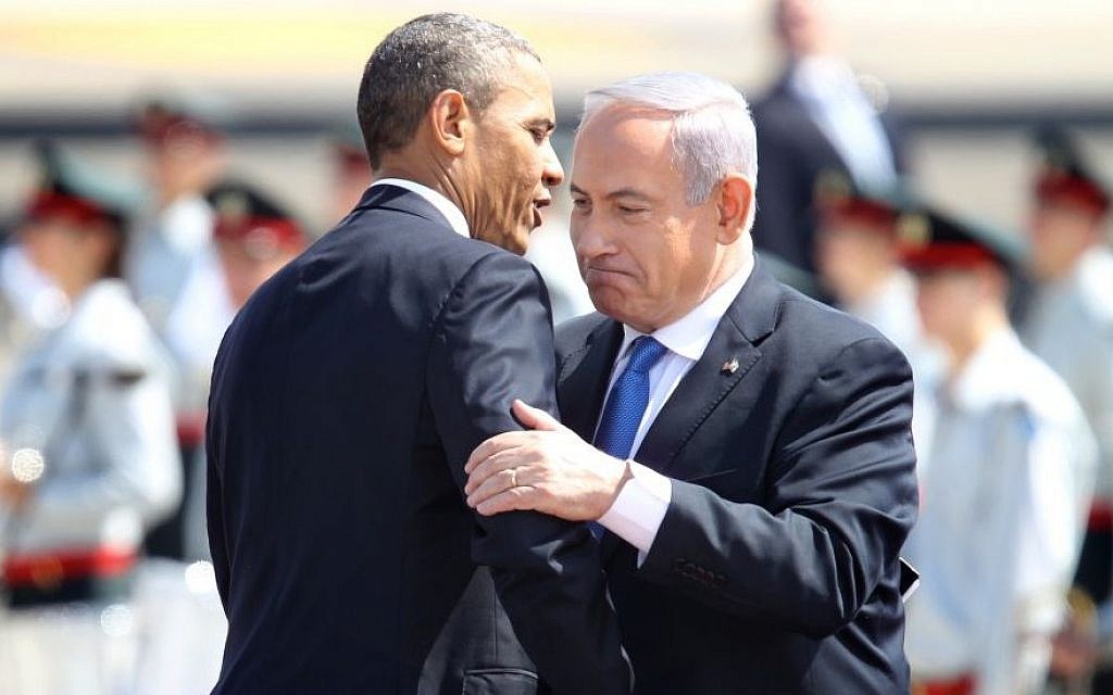 Prime Minister Benjamin Netanyahu and President Barack Obama embrace at a ceremony welcoming the US leader at Ben Gurion Airport near Tel Aviv, on March 20, 2013 (Miriam Alster/Flash90)