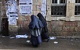 An illustrative photo of young ultra-Orthodox girls wearing clothing similar to girls in the Lev Tahor cult, walking in Jerusalem's Mea Shearim neighborhood. (Yaakov Naumi/Flash90)