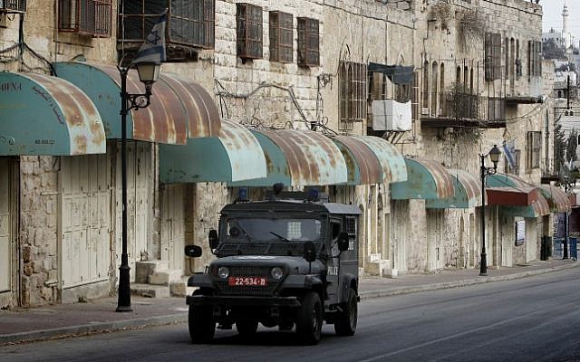 Illustrative photo of an Israeli army jeep in Hebron, November 7, 2013 (Miriam Alster/Flash90)