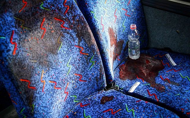 A bloodstained bus seat where soldier Eden Atias was stabbed to death by a young Palestinian man on a bus at the central bus station in Afula (photo credit: Avishag Shaar Yashuv/Flash90)