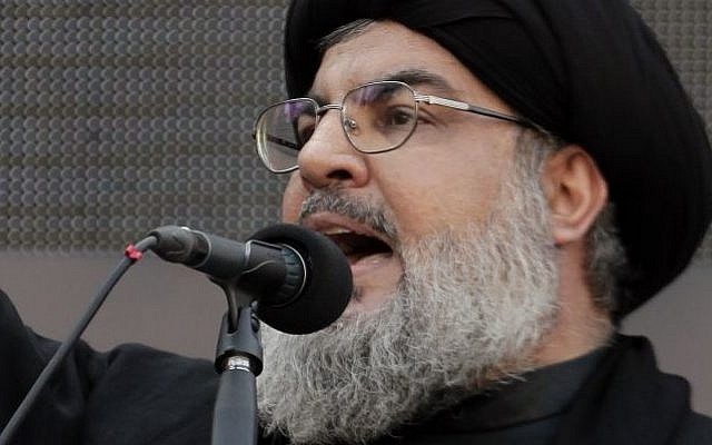 Hezbollah leader Sheikh Hassan Nasrallah during a rare public appearance, in the suburbs of Beirut, Lebanon in November 2013. (AP/Bilal Hussein)