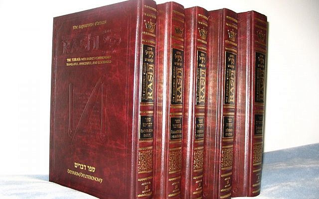 A photo of five volume The Sapirstein Edition Rashi Artscroll Chumash. (photo credit: public domain via Wikimedia Commons)