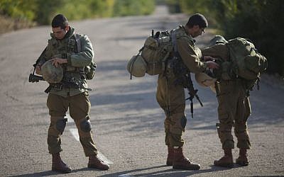 Israeli soldiers stand guard in Rosh Hanikra, Israel, near the border between northern Israel and Lebanon, on Monday, December 16, 2013. (photo credit: AP/Ariel Schalit)