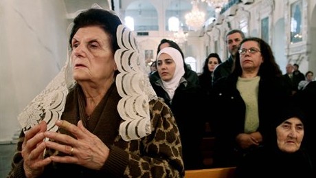 Syrian Christians and Muslims offer prayers for nuns held by rebels, at the Greek Orthodox Mariamiya Church in Damascus, Syria, on Sunday, December 8, 2013. (photo credit: AP)