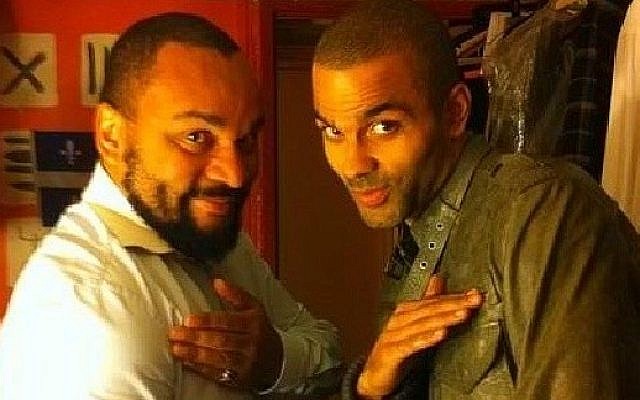 NBA star Tony Parker, right, performs the quenelle gesture with its inventor, French comedian Dieudonne (photo credit: Instagram/Bestquenelle)