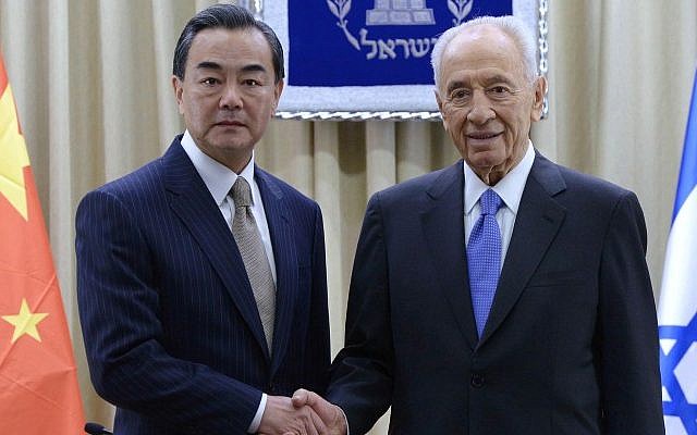 Israeli President Shimon Peres meets with Chinese Foreign Minister Wang Yi at the President's residence in Jerusalem, December 19, 2013 (photo credit:  Mark Neyman/GPO/Flash90)