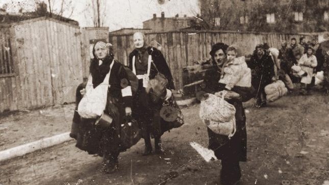 Illustrative photo of Lodz Ghetto residents, who head toward the trains that will take them to Chelmno extermination camp, in Poland (photo credit: unknown)