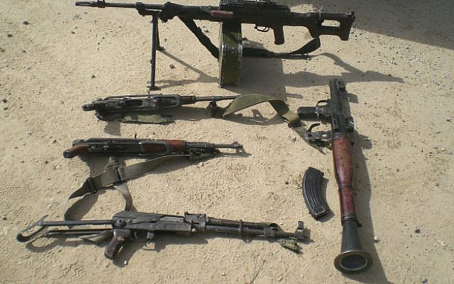 Illustrative photo of RPG anti tank missile, three AK 47 assault rifles and two explosive devices (photo credit: IDF Spokesperson/Flash90)