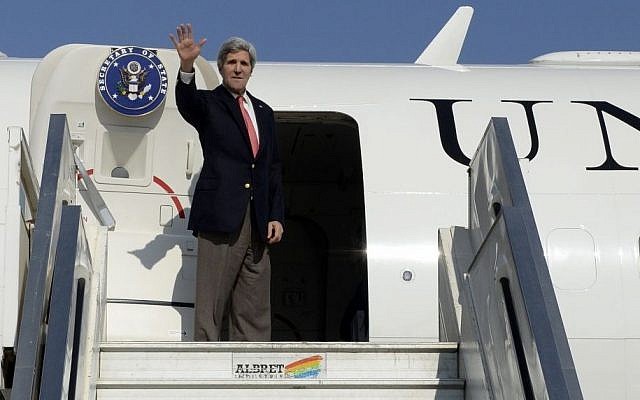 US Secretary of State John Kerry boards his plane on departure from Ben Gurion International Airport on  January 6, 2014. (photo credit: Matty Stern/US Embassy of Tel Aviv/Flash 90)