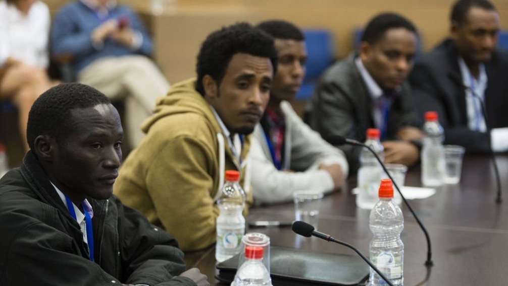 Asylum seeker Jacob Barry seen together with other representatives of the African refugee debate, seen at a discussion regarding the Immigration Authority policy towards asylum seekers and the impact on the business sector, at a meeting of the Committee on Foreign Workers, in the Israeli parliament on January 15, 2014 (photo credit: Flash90)