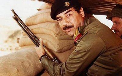 Saddam Hussein during Iran-Iraqi war in the 1980s. (Public domain, Wikimedia Commons)