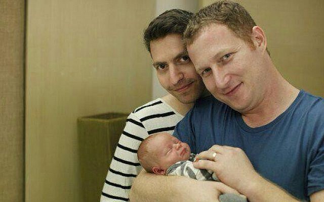 Illustrative: Eran Pnini Koren and Avi Koren, a gay Israeli couple, with their child conceived through a surrogacy procedure in Thailand. (Facebook)