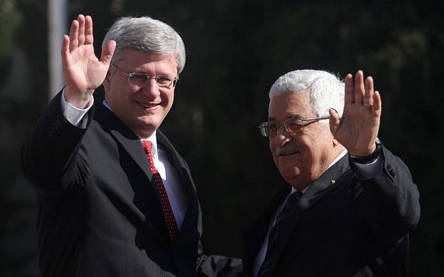 Canadian Prime Minister Stephen Harper with Palestinian Authority President Mahmoud Abbas during the welcome ceremony in the West Bank city of Ramallah, January 20, 2014 (photo credit: Issam Rimawi/Flash90)