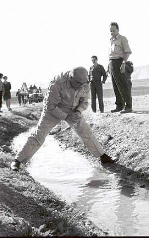 Prime Minister Levi Eshkol drining water during a 1967 visit to the Jordan Valley (Photo credit: Moshe Milner/ Government Press Office)