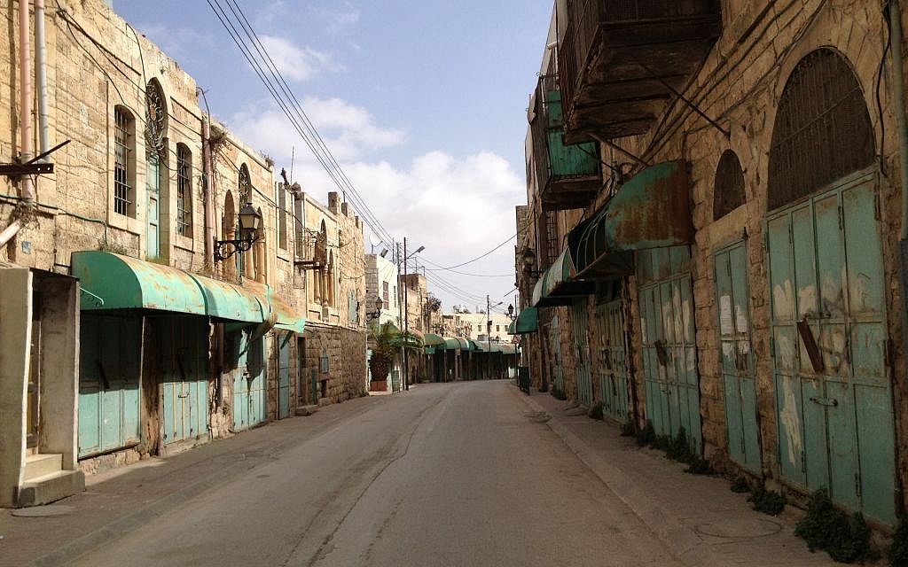 Once a bustling market, Shuhada street is currently closed to Palestinian pedestrian traffic, leaving it largely empty most days (Times of Israel staff)