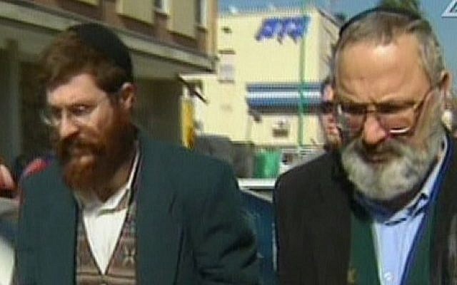 Eli Cohen, right, and Avihai Weinstein are suspected of selling arms to Iran. (screen capture: Channel 2)