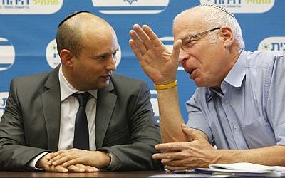 Naftali Bennett (L), leader of the Jewish Home party, seen with Jewish Home MK Uri Ariel at a faction meeting in the Knesset on October 28, 2013. (photo credit: Miriam Alster/Flash90)