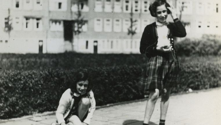 Anne Frank (L) plays with her friend Hanneli Goslar (R) on the Merwedeplein square in Amsterdam, May 1941. (AP Photo/Anne Frank House Amsterdam/Anne Frank Fonds Basel photo collections)