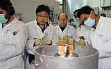 IAEA inspectors at Iran's nuclear power plant in Natanz on January 20, 2014. (IRNA/AFP Kazem Ghane/File)