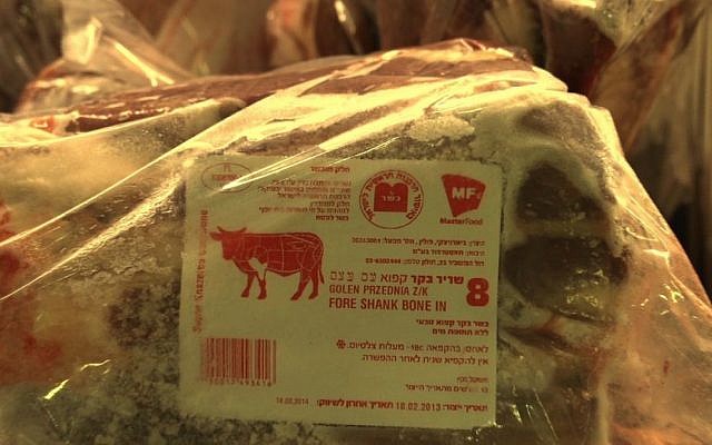 Illustrative: Kosher meat slaughtered in Poland  bears the symbol of the Warsaw rabbinate. (JTA)