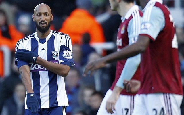 West Bromwich Albion's French striker Nicolas Anelka celebrates with a quenelle after scoring a goal, Dec. 28, 2013 (photo credit: AFP/Ian Kington)