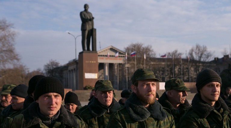Pro-Russian volunteers gather at Lenin Square in Simferopol, Crimea, on March 14, 2014 (photo credit: AFP/Daniel Leal Olivas)