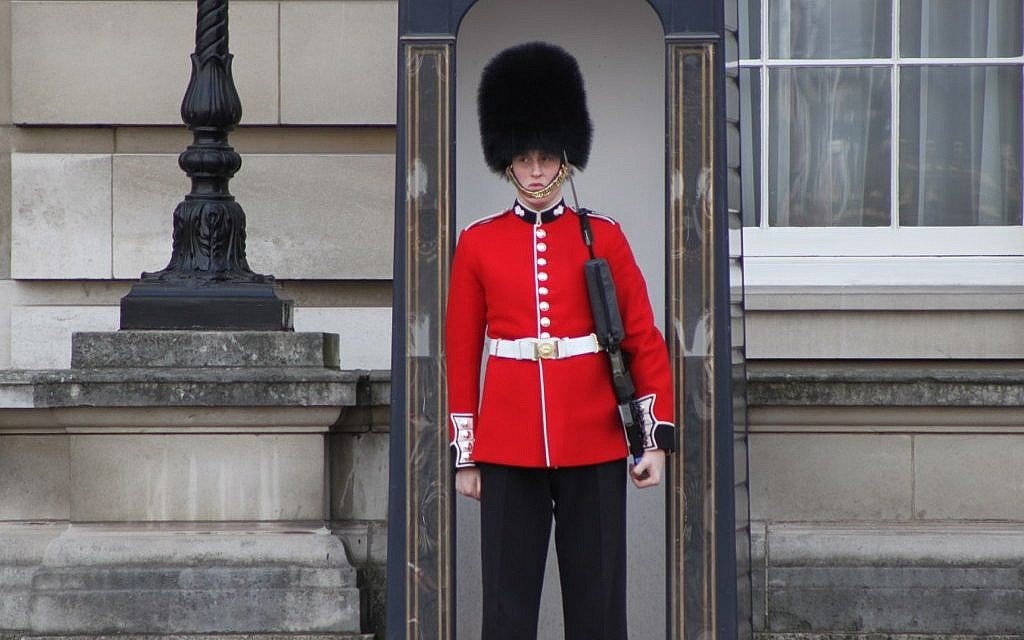 buckingham palace guards smile