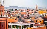 A view of the medina, or old city, of Marrakech, with the Atlas Mountains in the distance. (photo credit: Michal Shmulovich)
