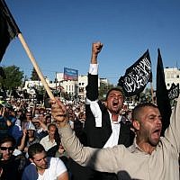 Supporters of Hizb ut-Tahrir demonstrate in Ramallah,  July 7, 2012 (photo credit: Issam Rimawi/Flash90)