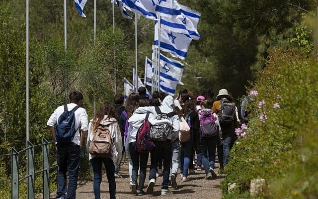 Israeli youth walk on the road connecting Yad Vashem to Mount Herzl in Jerusalem, ahead of the annual Memorial Day for Fallen Soldiers, April 10, 2013 (photo credit: Flash90)