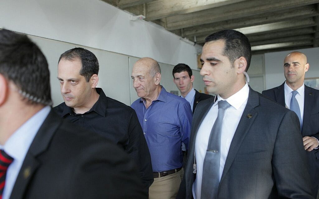 Former prime minister Ehud Olmert arrives in the Tel Aviv District Court on Monday, March 31, 2014 (photo credit: Dror Einav/POOL/Flash90)
