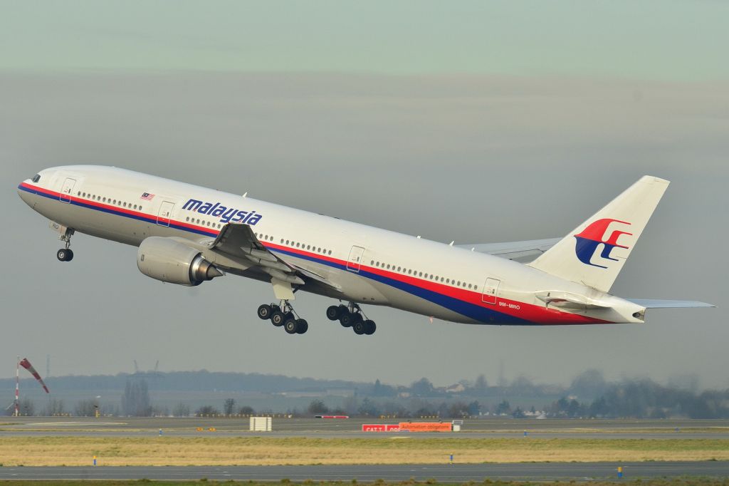This photo taken Dec. 26, 2011, shows the Malaysia Airlines Boeing 777-200ER that disappeared from air traffic control screens Saturday, taking off from Roissy-Charles de Gaulle Airport in France. The Malaysia Airlines Boeing 777-200 carrying 239 people lost contact with air traffic control early Saturday morning, March 8, 2014 on a flight from Kuala Lumpur to Beijing, and international aviation authorities still hadn't located the jetliner several hours later. (photo credit: AP/Laurent Errera) 