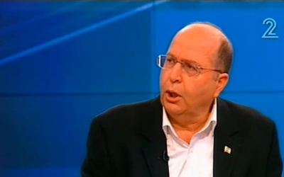 Defense Minister Moshe Ya'alon speaks during an interview on Saturday, March 15, 2014. (screen capture: Channel 2)