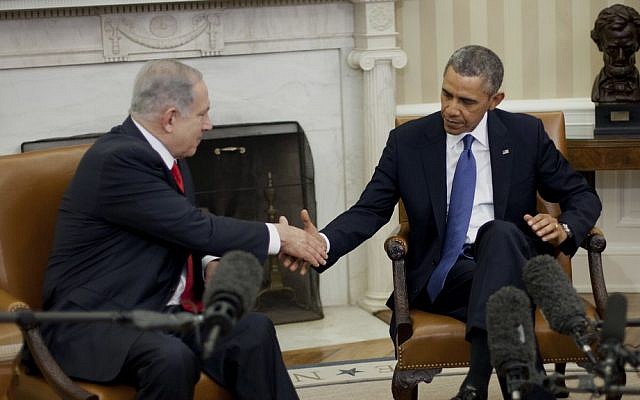 US President Barack Obama and Prime Minister Benjamin Netanyahu shake hands in the Oval Office of the White House in Washington, Monday, March 3, 2014 (photo credit: AP/Pablo Martinez Monsivais)