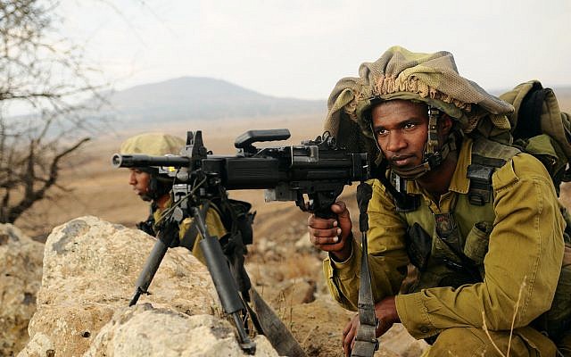 Illustrative: An IDF soldier in a Nahal Brigade drill in the Golan Heights. (Nir Gal/IDF Spokesperson's Unit)