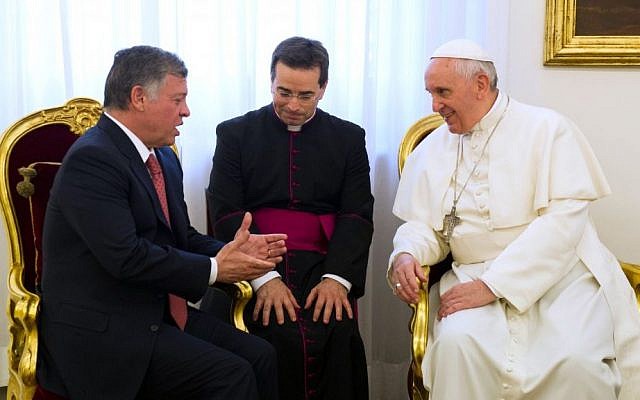 Pope Francis, right, listens to King Abdullah II of Jordan during an audience at the Vatican, Monday, April 7, 2014. (photo credit: AP/L'Osservatore Romano)