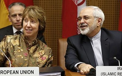 Vice President of the European Commission Catherine Margaret Ashton (L) and Iranian Foreign Minister Javad Mohammad Zarif attend the so called EU 5+1 talks with Iran at the UN headquarters in Vienna, on May 14, 2014.  (photo credit: AFP Photo/Dieter Nagl)
