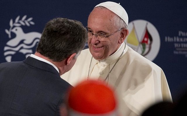 Pope Francis is greeted by Jordan's King Abdullah II during a meeting at the Royal Palace in Amman on May 24, 2014. (Photo credit: AFP/Pool/Andrew Medichini)