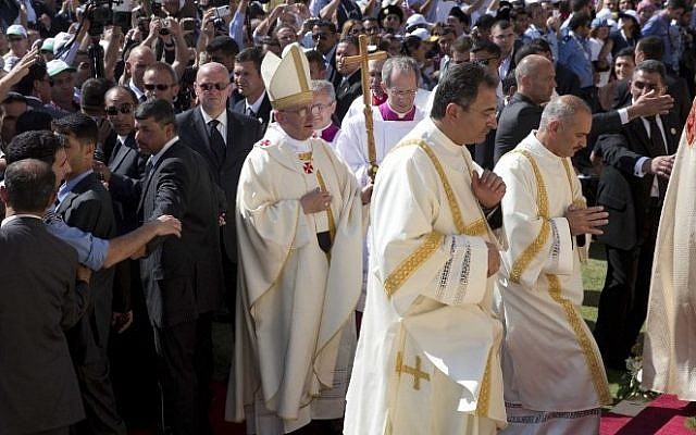 Pope Francis arrives to celebrate a mass at the Amman stadium on May 24, 2014 in the Jordanian capital (photo credit: AFP/ POOL/Andrew Medichini)