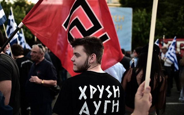 Illustrative: Supporters of the Greek ultra-nationalist party Golden Dawn. (AFP/Aris Messinis)