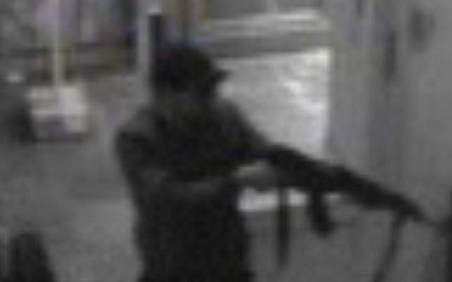 This video grab released shows the suspect of the killings in the Jewish Museum on Belgium on May 24, 2014 in Brussels. (AFP photo/Belga/Belgian Federal Police)