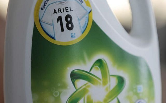 An Ariel liquid detergent bottle with an '18' on it sits in Berlin Germany, Friday, May 9, 2014. Detergent manufacturer Procter & Gamble has kicked up a froth in Germany after unintentionally placing a neo-Nazi code on promotional packages for Ariel washing powder. The use of Nazi slogans in public is banned in Germany, which neo-Nazis often try to circumvent by using codes. '18' stands for Adolf Hitler. (photo credit: AP Photo/Ferdinand Ostrop)
